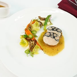 Chicken Roulade with Spring Vegetables and Mustard Jus