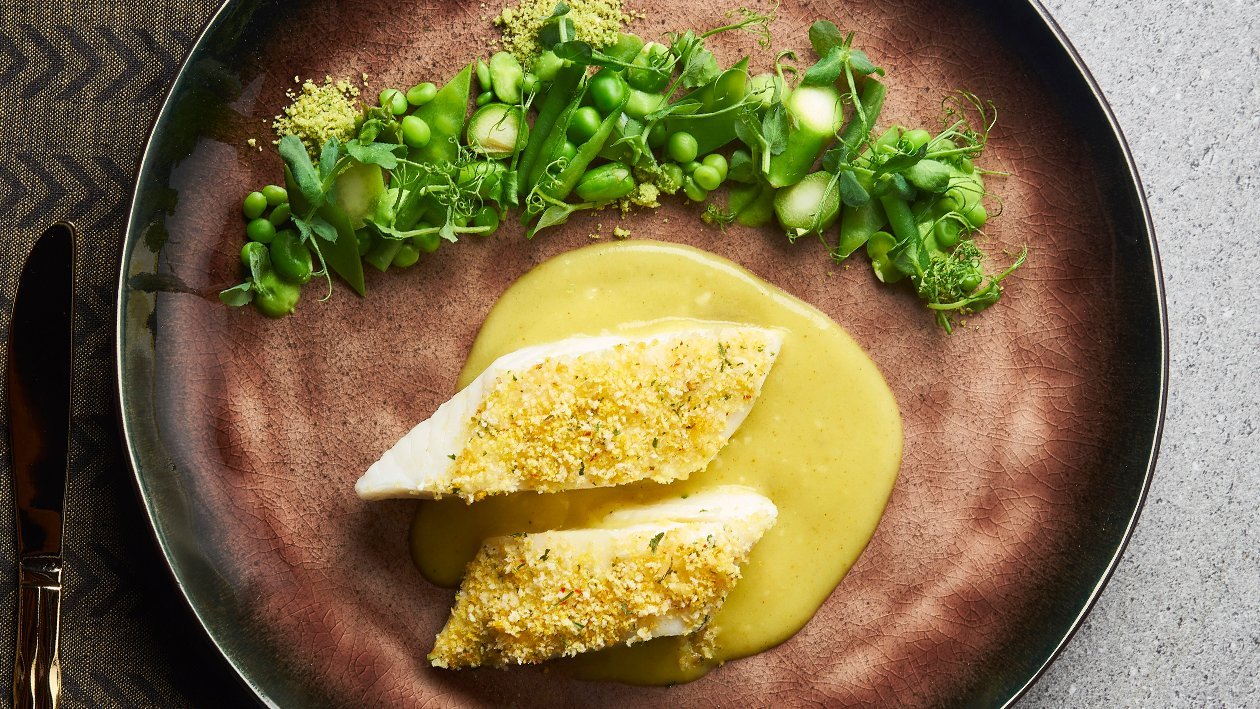 Baked Chilean Sea Bass and Coconut Herb Crust with Green Salad and S.E.A. Spice Veloute  – - Recipe