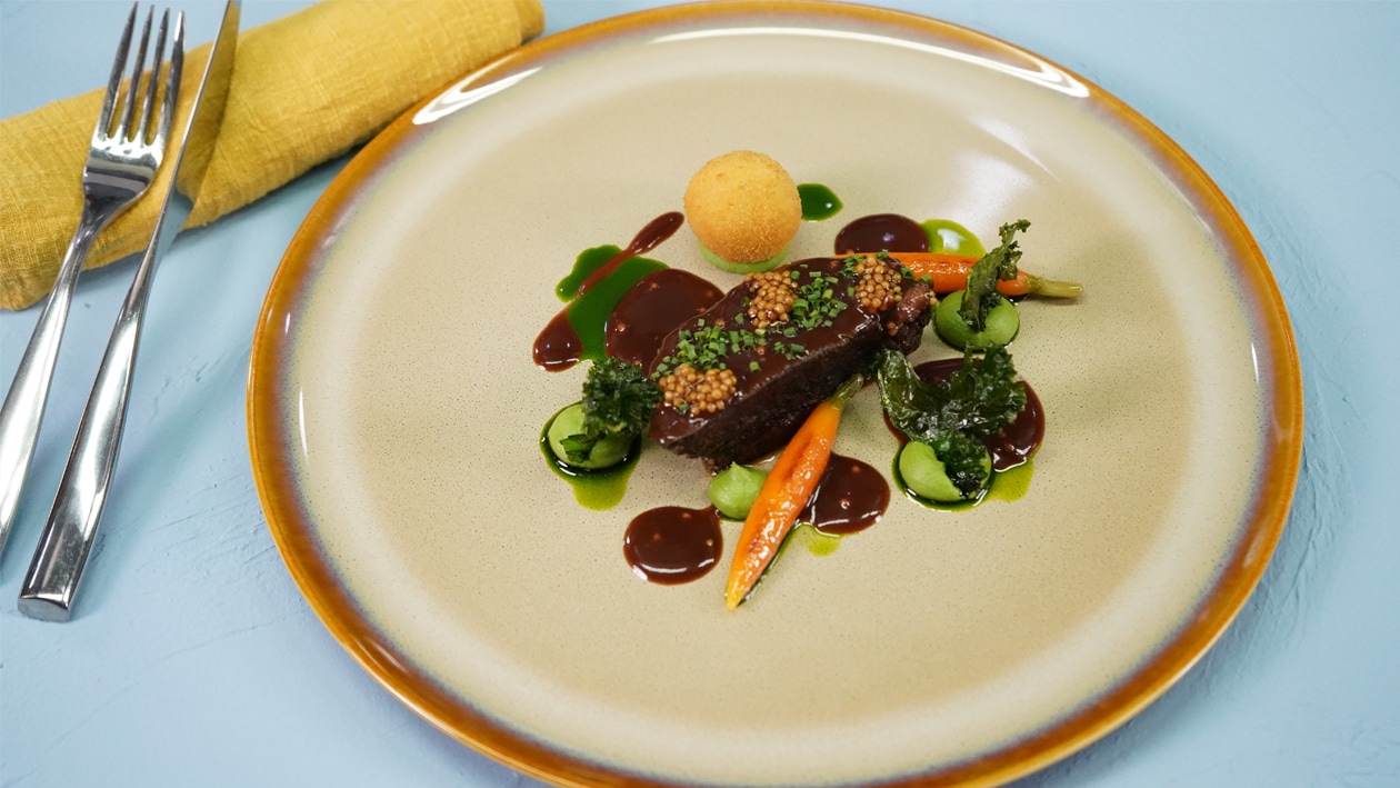 Braised Beef Cheek with Yellow Mustard Jus, Glazed Baby Carrots and Crispy Kale – - Recipe