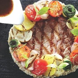 Veal Ribeye with Grilled Vegetables and Black Garlic Sauce