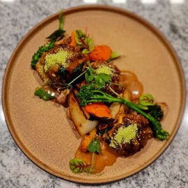 Charred Cheese Meatballs with Pan Jus and Herb Garlic Crust