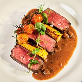 Roast Beef Tenderloin with Vegetables and Sauce Diane