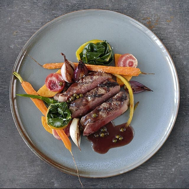 Roasted Ribeye Steak with Green Peppercorn Sauce